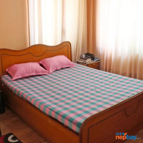 Medium sized checkered Nepali cotton bedsheet